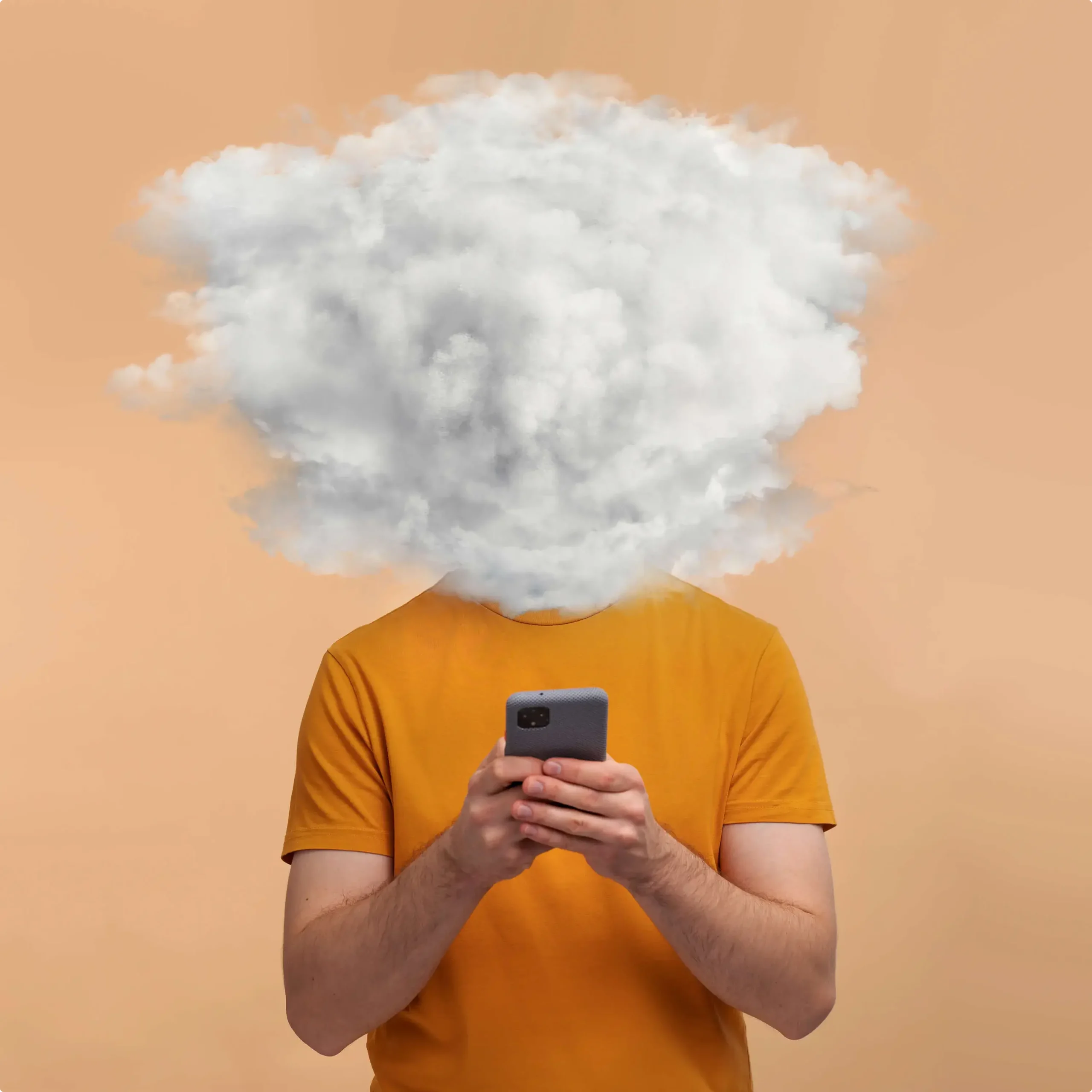 تصویر فردی غرق در گوشی با صورتی پوشیده در ابر؛ نمادی از حواس‌پرتی و نیاز به دوپامین دتوکس